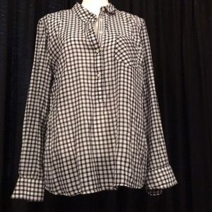 Black and white plaid checkered shirt.